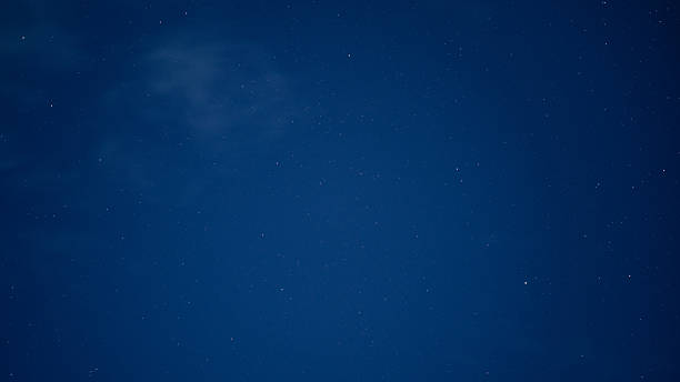 istock Natural Tranquil Night Sky With Stars and Subtle Clouds in a Calm Atmosphere 2233963093