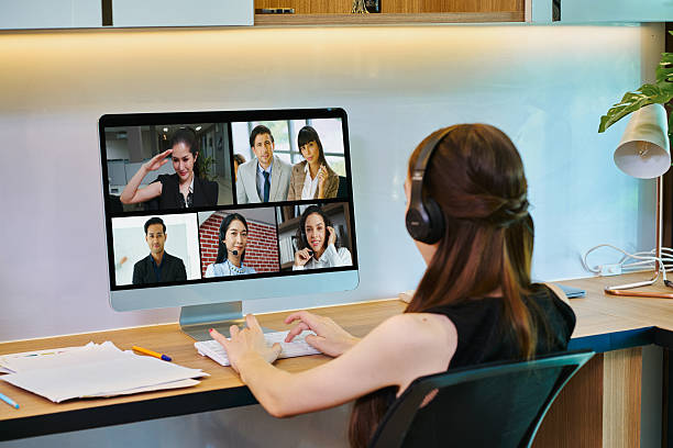 istock Businesswoman working with conference with team member on comput 2233963315