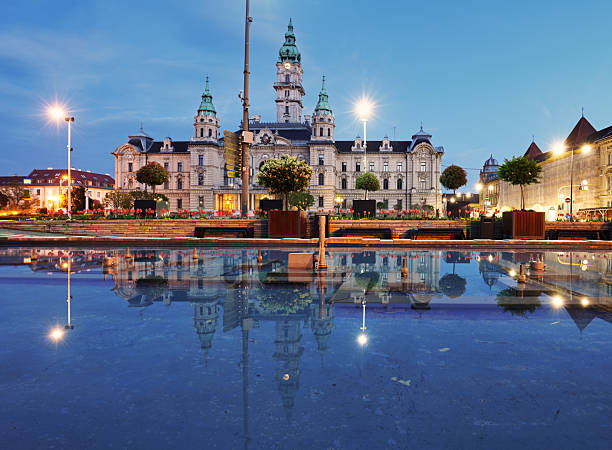 istock Gyor Town hall at night with reflection in water, Hungary 2233964092