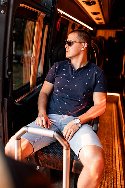 istock Male Driver Sitting in Van After Entering Vehicle 2233965936