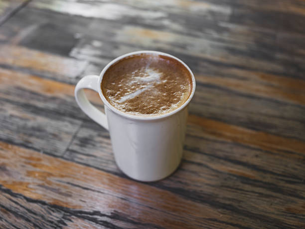 delicious latte coffee in cozy cafe