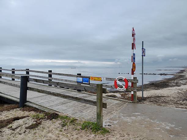 istock Wooden boardwalk leading to Rydeback shoreline 2233973914
