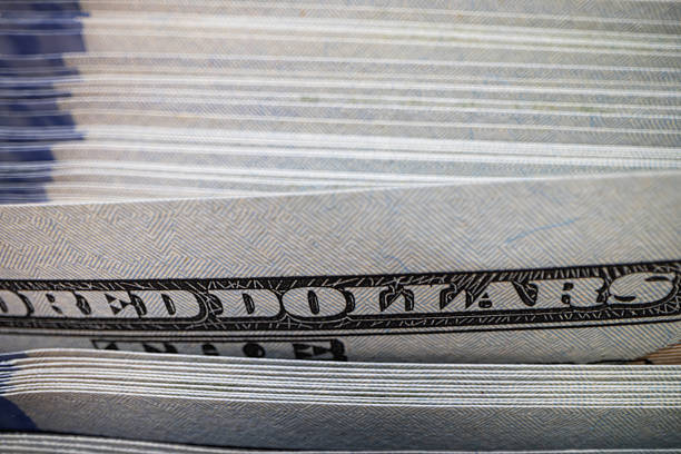 Macro details of 100 dollar bill