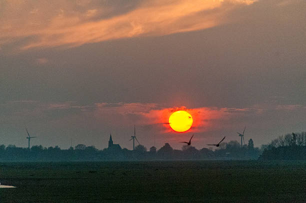A beautiful sunset in the Frysian countryside on evening in early May.
