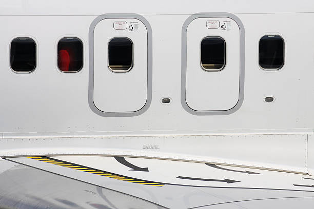 istock overwing emergency exits of an airliner 2233976819