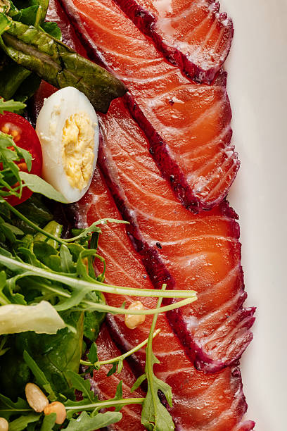 Beet-Cured Salmon with Fresh Greens and Quail Egg