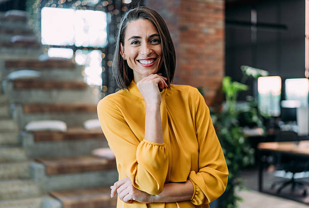 istock Confident businesswoman in modern office. 2233988943