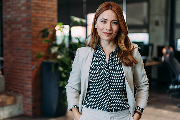istock Confident businesswoman in modern office. 2233988947