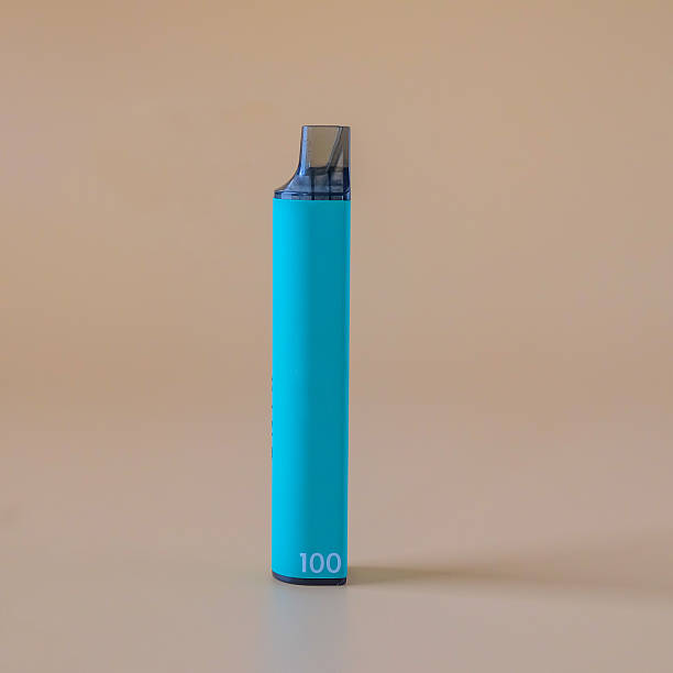 istock A electronic cigarette on color background. The concept of modern alternative smoking. 2233991620