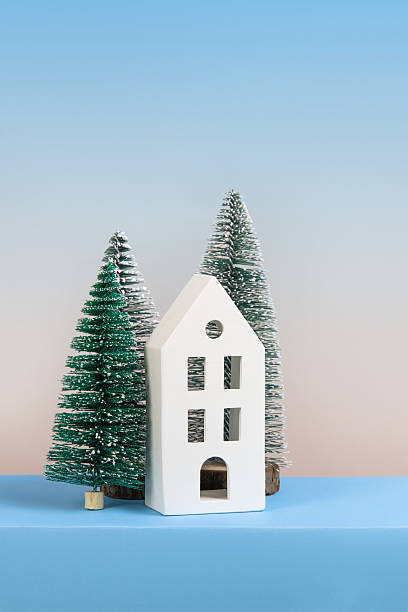 istock Christmas background with trees and house 2233992121
