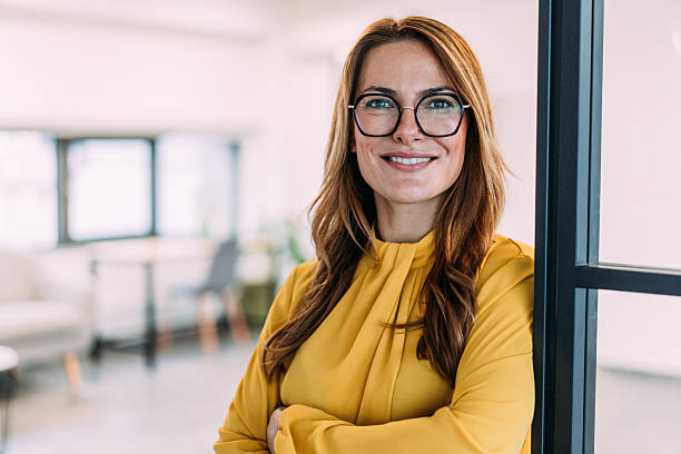 istock Confident businesswoman in modern office. 2233992372