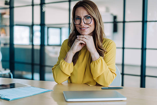 istock Confident businesswoman in modern office. 2233992373