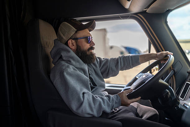 istock Bearded Male Truck Driver in Relaxed Mood 2233993780