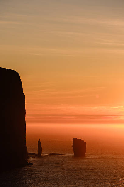 istock Majestic sunset over Risin og Kellingin rock formations in Faroe Islands 2233994688