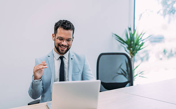 istock Businessman having video call in the office. 2233994873