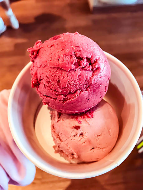 Strawberries, cranberries, pink ice cream balls
