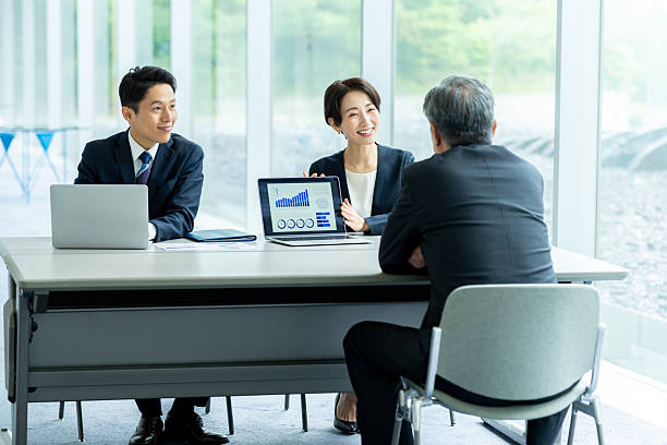 istock businessmen having a meeting 2233997416
