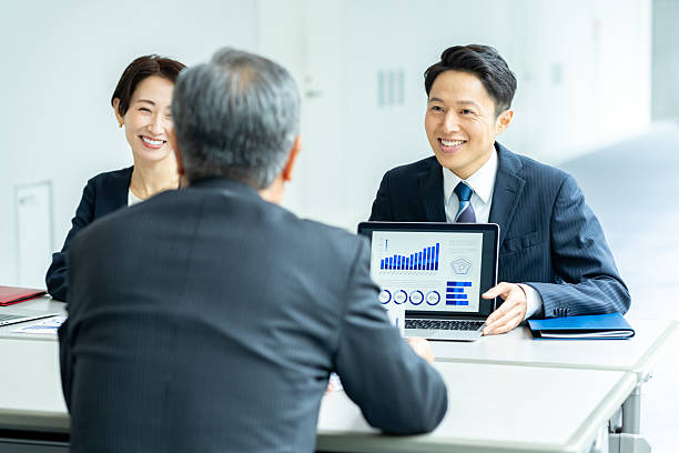 istock businessmen having a meeting 2233997481