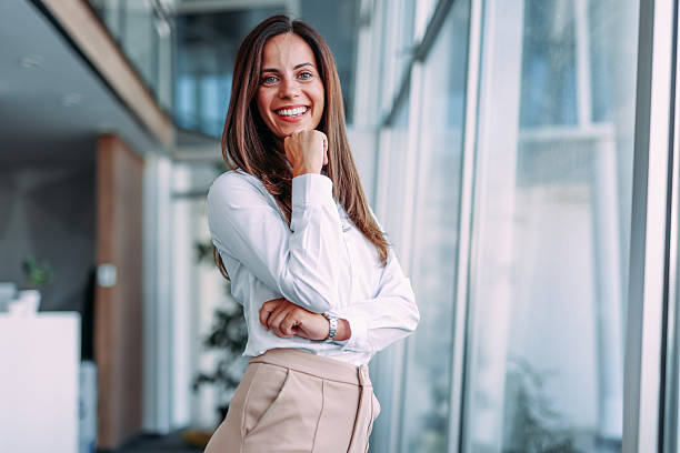 istock Confident businesswoman in modern office. 2233997785