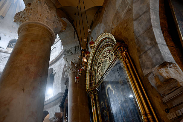 Jerusalem, Israel - April 24th, 2019 : Holy Saturday Christian Easter Mass inside the famous Church of the Holy Sepulchre in front of the Aedicula - Jesus' Empty Tomb. Jerusalem, Israel, Middle East