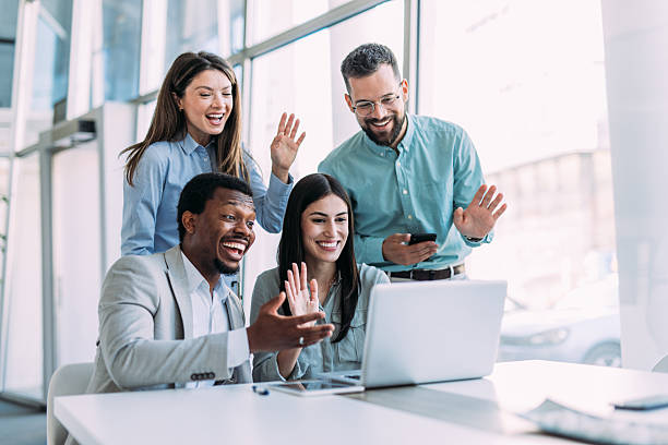 istock Businesspeople having video call in the office. 2233999729