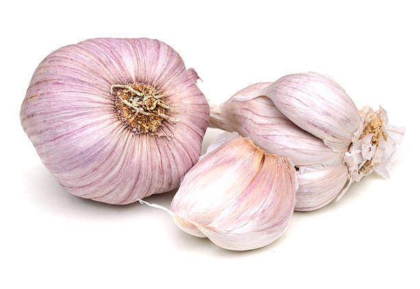 istock Garlic and clove on white 2234003555