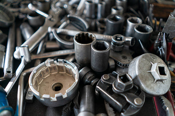 istock A disorganized assortment of metal tools and hardware components. 2234006064