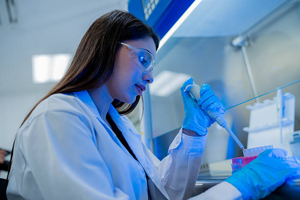 istock Scientist conducts experiments in laboratory using pipette for precise measurements and analysis of samples 2234007290