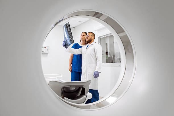 istock Medical professionals analyzing MRI scans in a modern clinic 2234007366