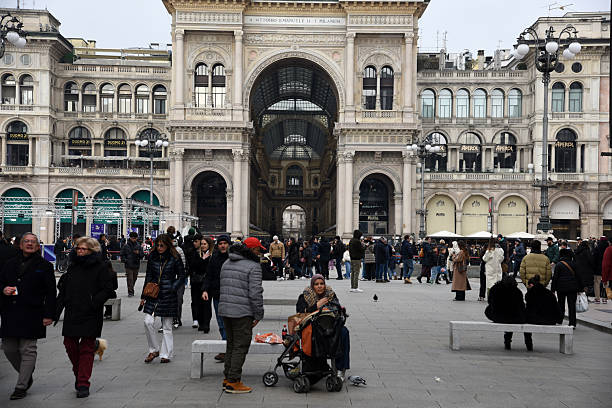 Galleria Vittorio Emanuele II in Milan. The image shows Italy's oldest active shopping arcade and a major landmark of Milan with several tourists.