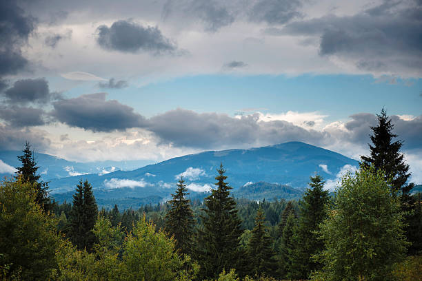 istock Scenic mountain landscape under cloudy sky 2234014256