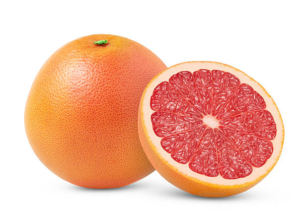 istock Pink whole grapefruit and half isolated. Grapefruit half with zest isolated with clipping path. Full depth of field 2234014628