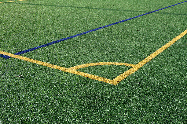 istock close up on football field with green artificial grass 2234016738