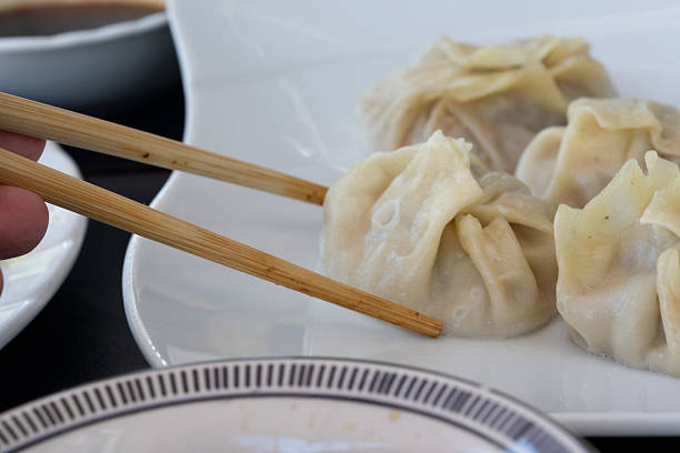 istock Steamed Delights: Fluffy Uyghur Momo Served with Soy Sauce 2234018832