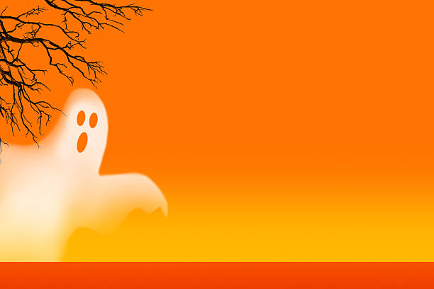 A ghost and branches of a bare tree in front of an orange Halloween sky.