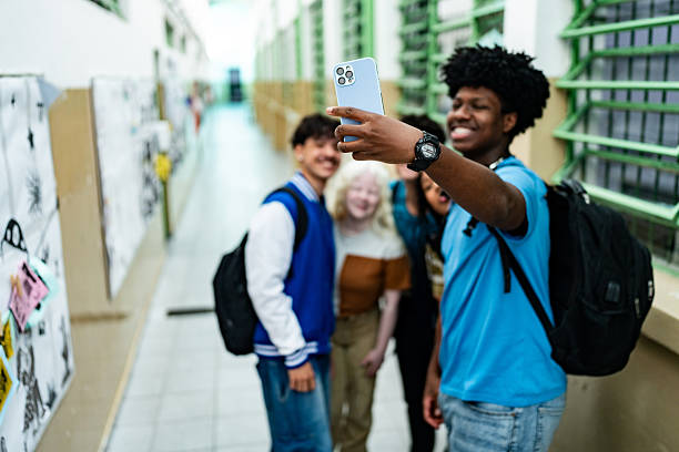 istock Student friends taking a selfie in the school 2234029054
