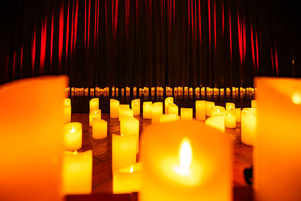istock A stage decorated with a set of glowing candles. 2234038398