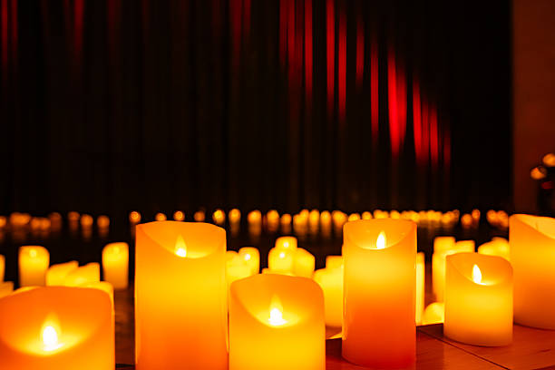 istock A stage decorated with a set of glowing candles. 2234038400