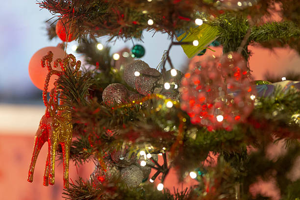 istock Festive Christmas Tree Decorations with Lights and Ornaments 2234044622