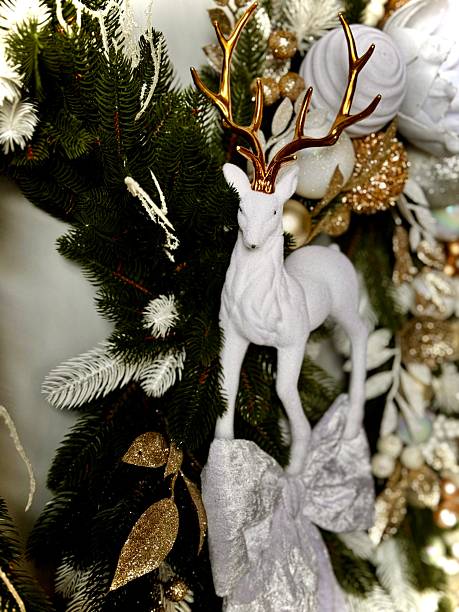 istock festive christmas wreath with deer and white bow 2234048071