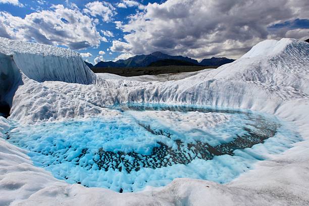 istock Expansive glacier with striking blue meltwater 2234050529