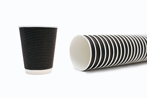 istock A large number of black disposable cardboard cups on a white background 2234058837