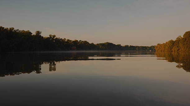 istock Peaceful Morning Light Over Serene River Landscape 2234067950