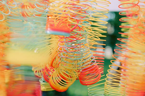 istock Lots of bright colorful spirals. Abstract blurred background with selective focus on waves 2234070676
