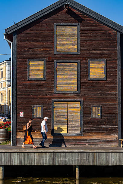 Hudikskvall, Sweden July 15, 2025 People walking in the landmark canal in the center of town