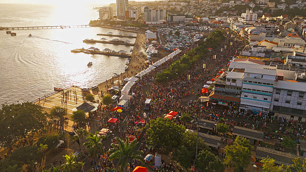 istock Festive Crowd Celebrating Along Waterfront in Martinique 2234072947