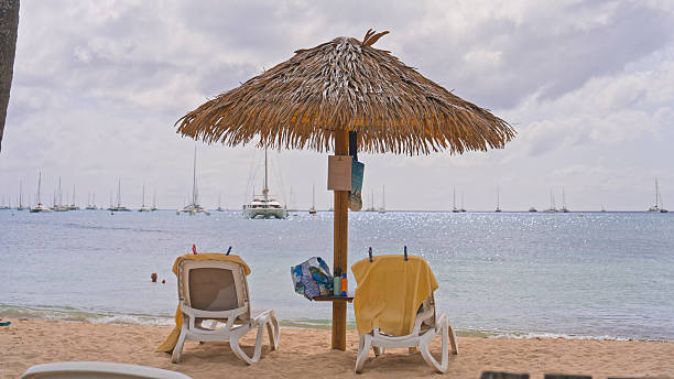 People on Reduit Beach, Rodney Bay, St. Lucia, West Indies.