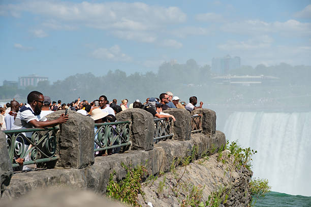 Tourists and people from all around the world come to visit the Niagara Waterfalls, a natural phenomenon in Ontario, Canada.