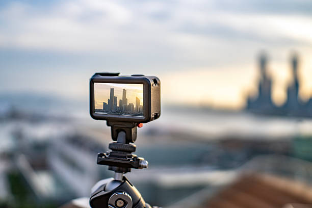 istock Action camera capturing cityscape during sunset for photography 2234075704