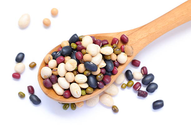 istock Mixed beans ingredients in wooden spoon background 2234077613